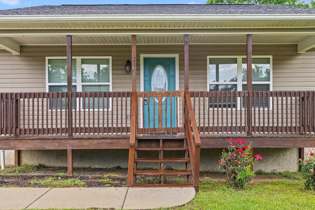 128 Mountain Breeze Ave, Dayton, TN 37321 - doorway to property featuring roof with shingles and a porch