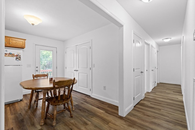 128 Mountain Breeze Ave, Dayton, TN 37321 - dining space with dark wood finished floors and baseboards