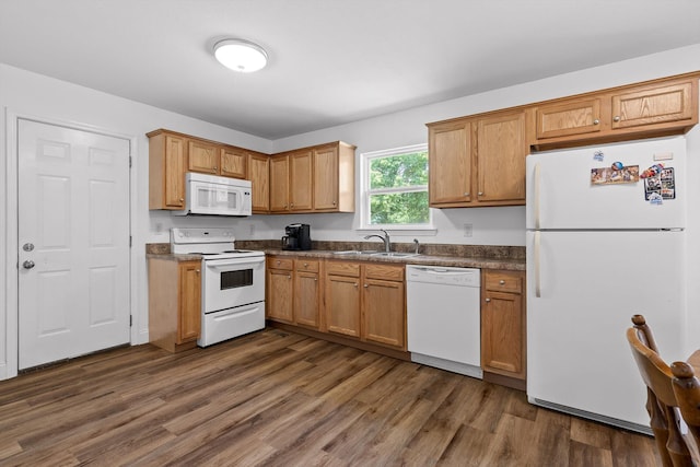 128 Mountain Breeze Ave, Dayton, TN 37321 - kitchen featuring white appliances, a sink, dark countertops, and dark wood-style flooring