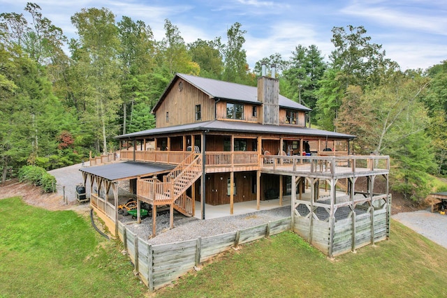 rear view of property with a deck