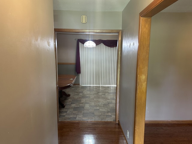 119 Cane Creek Rd, Rocky Top, TN 37769 - hallway with wood finished floors and baseboards