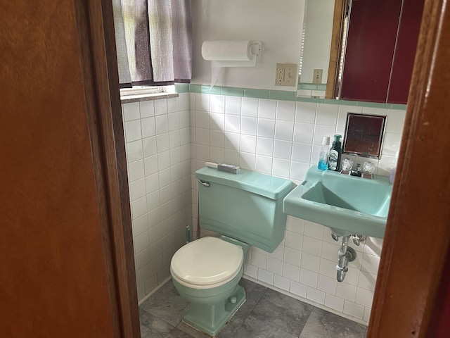 119 Cane Creek Rd, Rocky Top, TN 37769 - bathroom with tile walls, toilet, and a sink