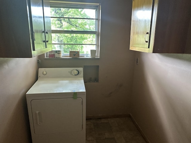 119 Cane Creek Rd, Rocky Top, TN 37769 - laundry area with washer / clothes dryer, cabinet space, healthy amount of natural light, and stone finish flooring
