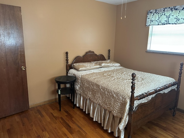 119 Cane Creek Rd, Rocky Top, TN 37769 - bedroom featuring wood finished floors and baseboards