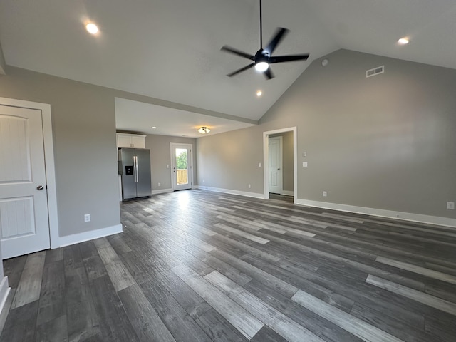 unfurnished living room featuring ceiling fan, dark hardwood / wood-style flooring, and high vaulted ceiling