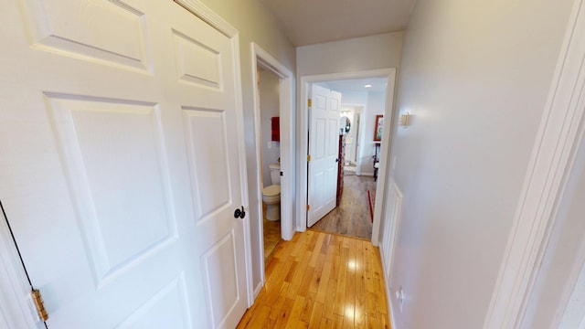 corridor featuring light wood-type flooring