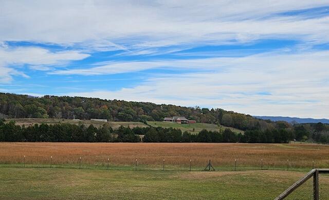 view of mountain feature featuring a rural view