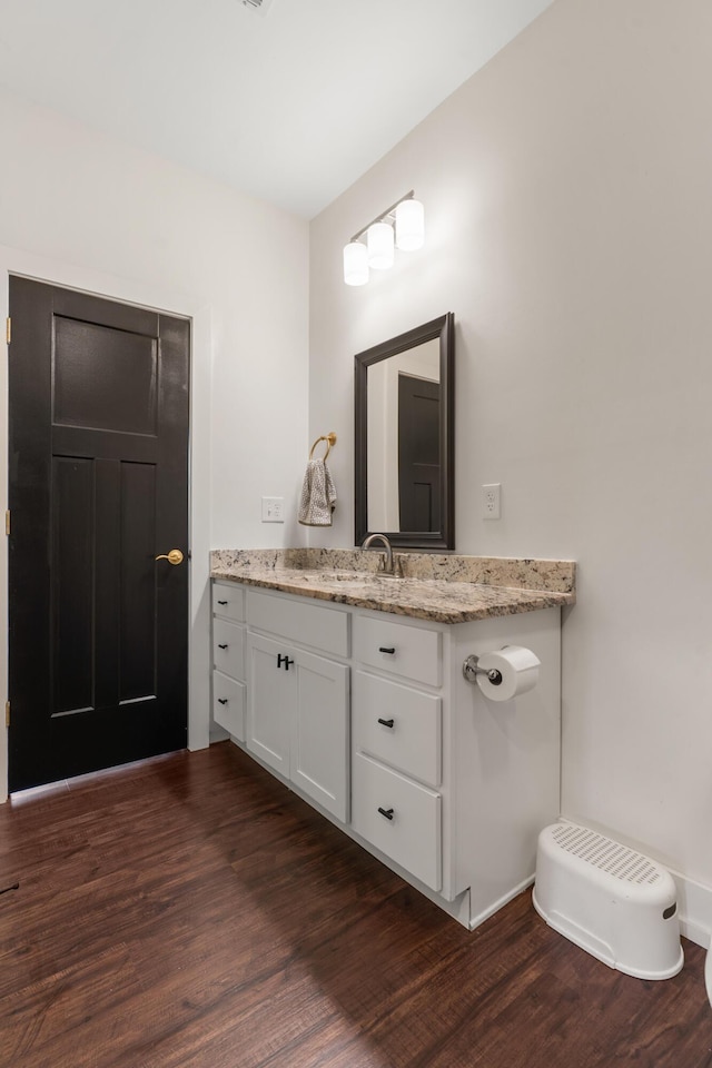 1323 Chippewa Ave SE, Cleveland, TN 37311 - bathroom featuring vanity and wood finished floors
