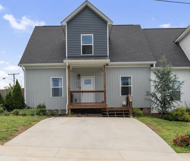 1323 Chippewa Ave SE, Cleveland, TN 37311 - view of front of home featuring a porch, roof with shingles, and a front lawn
