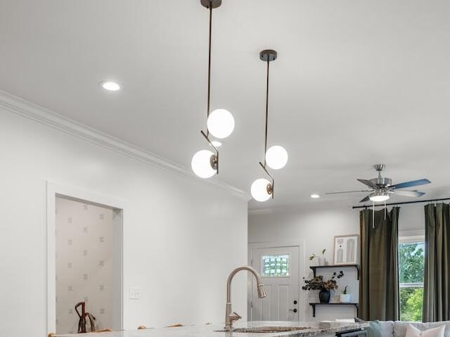 1323 Chippewa Ave SE, Cleveland, TN 37311 - kitchen view of ornamental molding, a sink, a ceiling fan, and recessed lighting