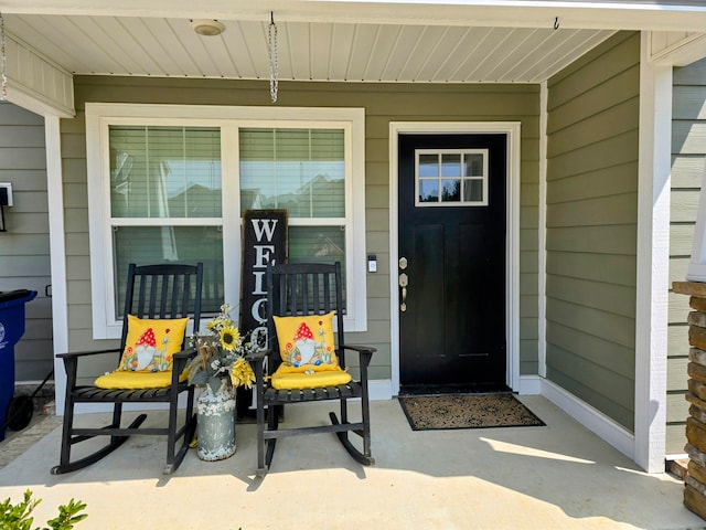 property entrance featuring covered porch