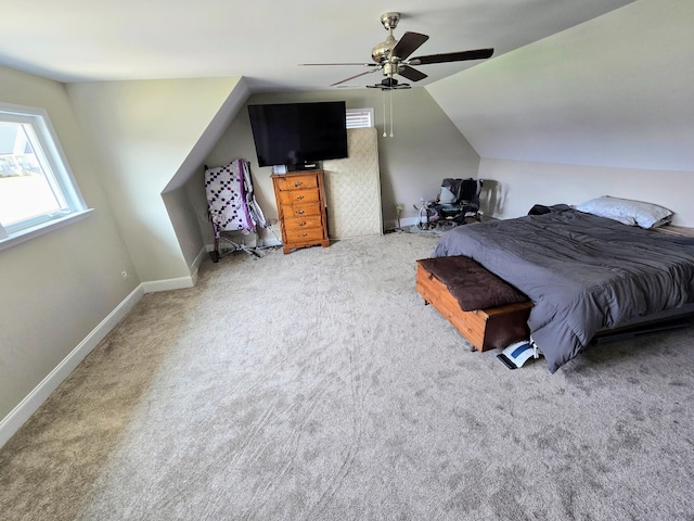 bedroom with carpet floors, ceiling fan, and lofted ceiling