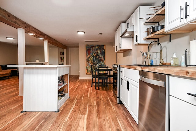 kitchen featuring ventilation hood, beam ceiling, appliances with stainless steel finishes, light hardwood / wood-style floors, and white cabinetry