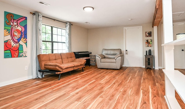 living room with light hardwood / wood-style floors