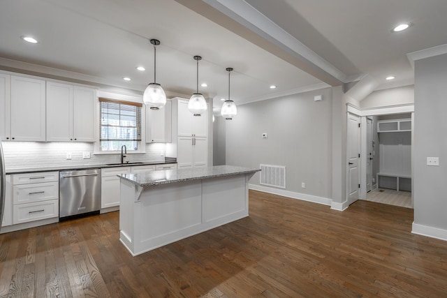 kitchen featuring pendant lighting, sink, dishwasher, a center island, and white cabinets