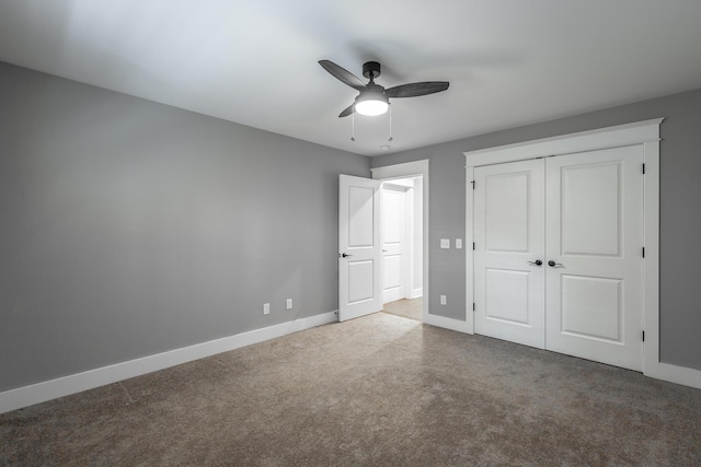 unfurnished bedroom featuring a closet, ceiling fan, and carpet flooring