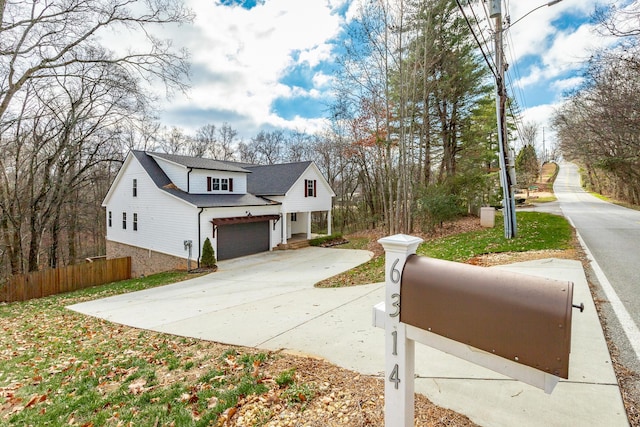 view of front of home with a garage