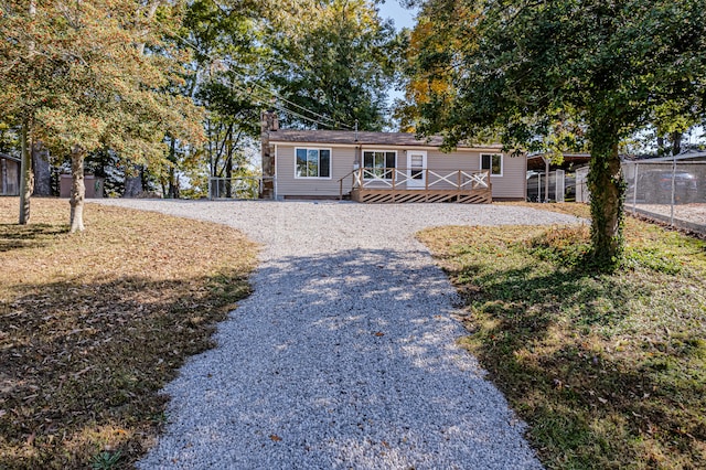 view of front of home with a deck