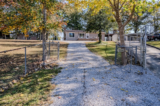 view of front of property featuring a wooden deck