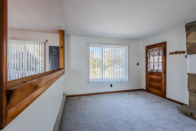 foyer featuring carpet flooring