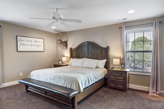 bedroom with recessed lighting, visible vents, dark colored carpet, and baseboards