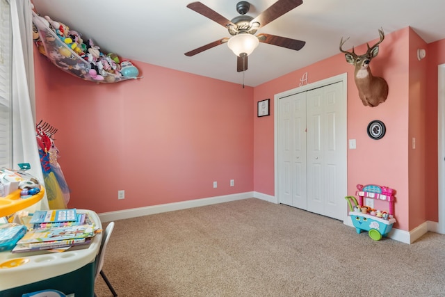 game room with ceiling fan, carpet, and baseboards