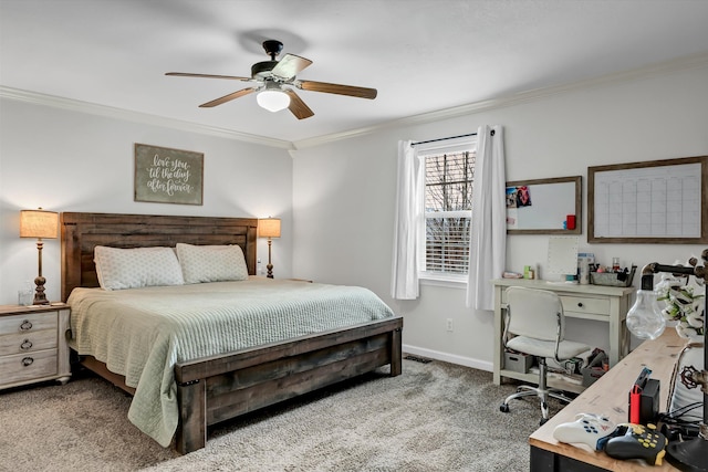 carpeted bedroom with ceiling fan and crown molding