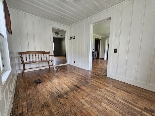 2783 No Pone Rd NW, Georgetown, TN 37336 - spare room featuring hardwood / wood-style floors, a decorative wall, and a ceiling fan