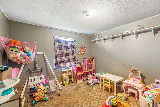 recreation room with carpet floors and a textured ceiling