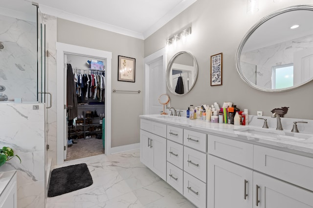 bathroom featuring vanity, a shower with door, and ornamental molding