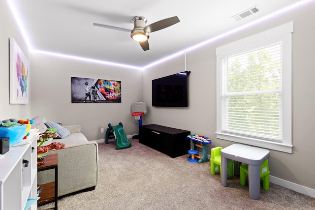 rec room featuring ceiling fan and carpet floors