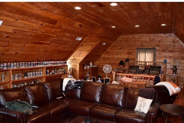 living room with wood walls, lofted ceiling, and wood ceiling