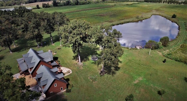 bird's eye view featuring a water view and a rural view