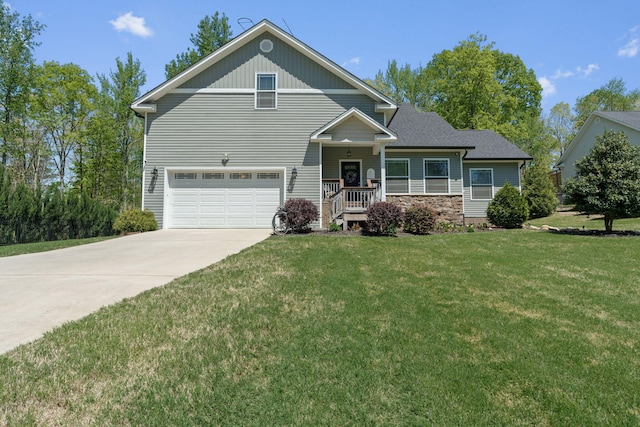 view of front of property with stone siding, driveway, a front lawn, and a garage