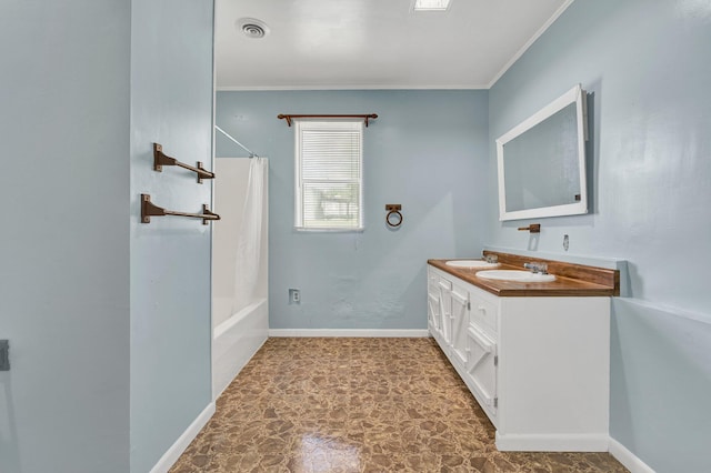 bathroom featuring vanity, shower / bathtub combination with curtain, and ornamental molding