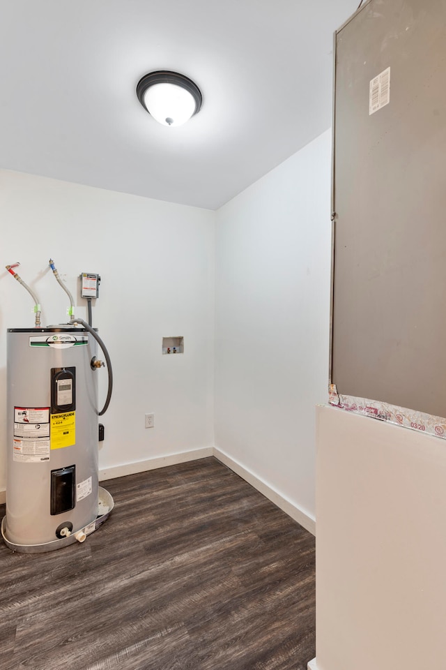 utility room with electric water heater