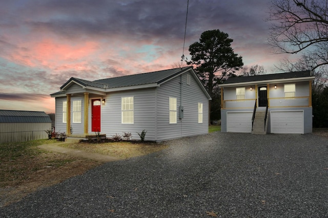 view of front of property featuring a garage