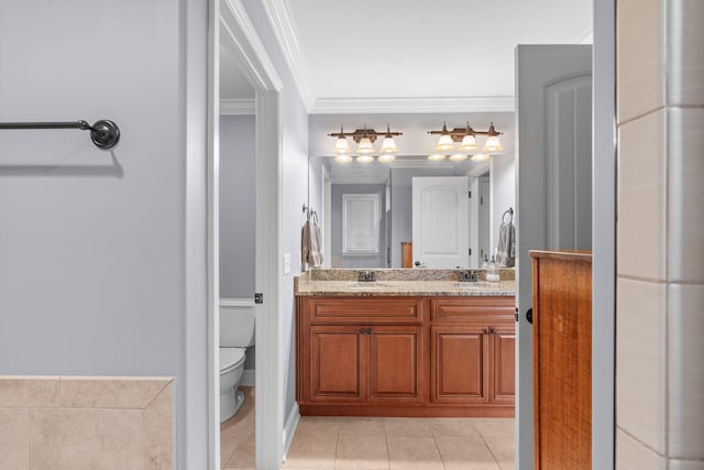 full bath featuring toilet, crown molding, tile patterned flooring, and a sink