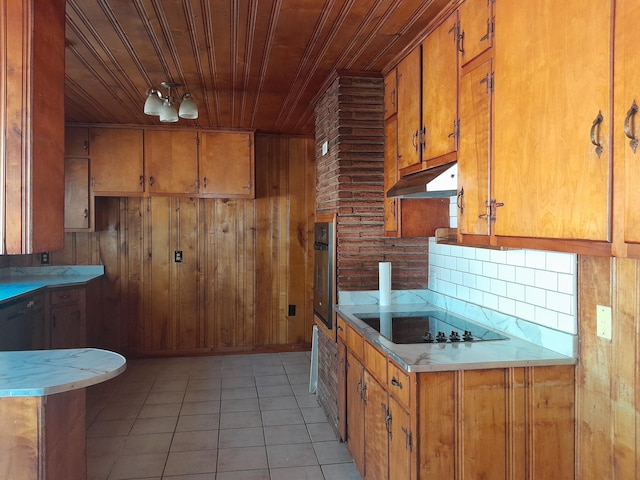 364 Cherokee Trl, Copperhill, TN 37317 - kitchen with black electric stovetop, wooden ceiling, oven, and brown cabinets