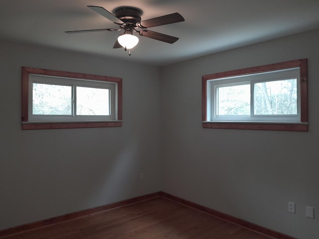 364 Cherokee Trl, Copperhill, TN 37317 - empty room with ceiling fan, baseboards, and dark wood finished floors
