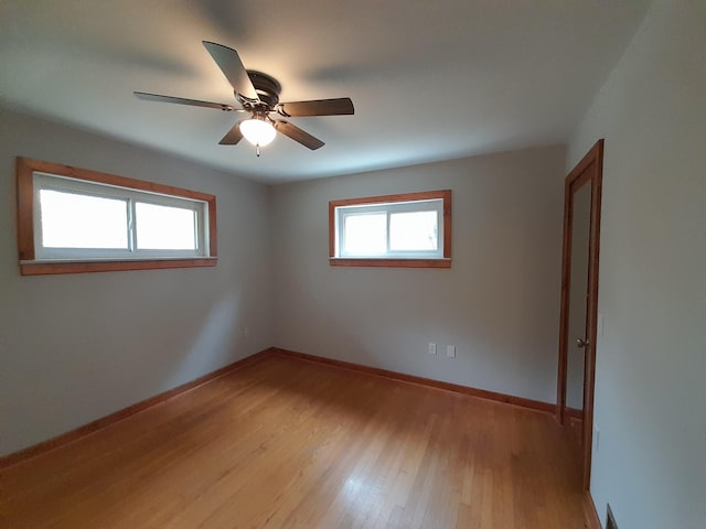 364 Cherokee Trl, Copperhill, TN 37317 - empty room featuring baseboards, a ceiling fan, and light wood-style floors