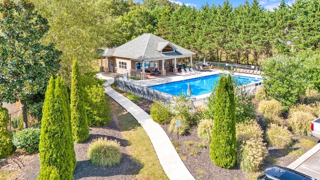 view of swimming pool with a patio