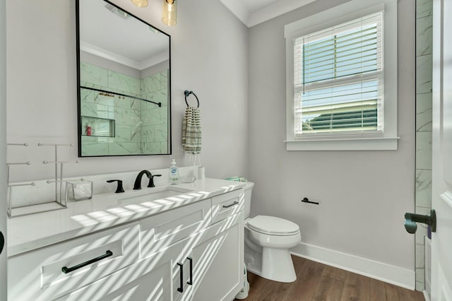 bathroom with walk in shower, toilet, hardwood / wood-style floors, and ornamental molding