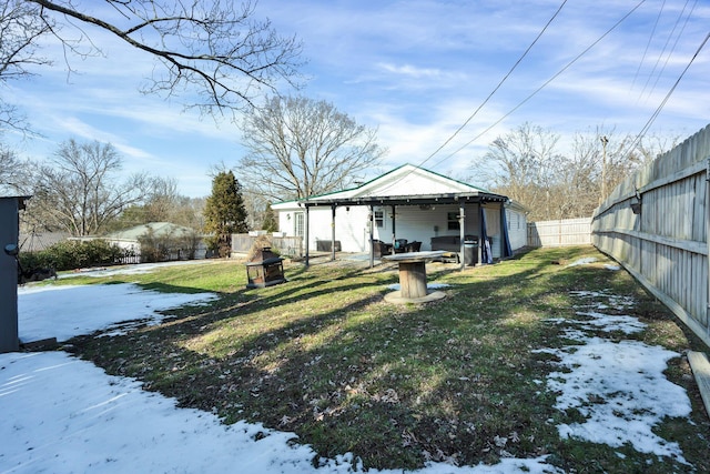 view of yard covered in snow