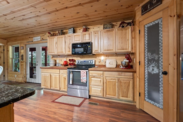 kitchen featuring wood ceiling, visible vents, black microwave, light brown cabinetry, and stainless steel electric stove