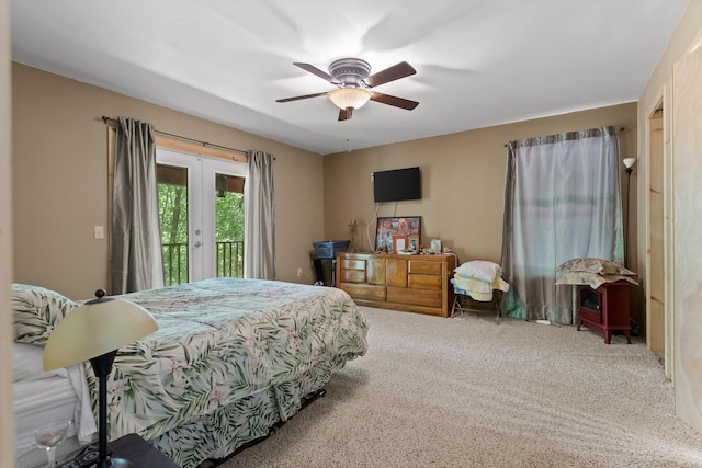 bedroom featuring french doors, access to outside, carpet flooring, and ceiling fan