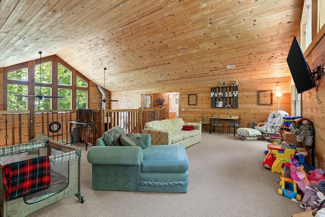 carpeted living room with wood ceiling, wooden walls, and vaulted ceiling