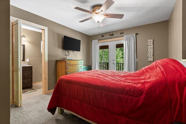 carpeted bedroom featuring baseboards, ceiling fan, access to outside, french doors, and ensuite bath