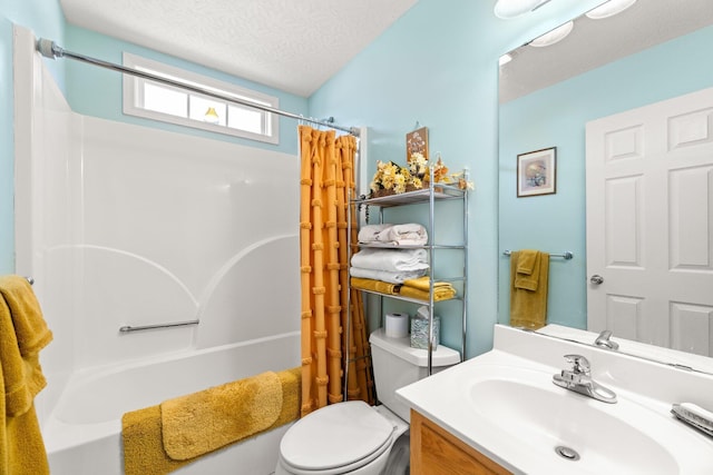 full bathroom featuring toilet, vanity, shower / tub combo with curtain, and a textured ceiling