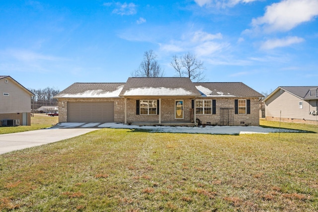 ranch-style home with a garage, a front yard, and central air condition unit